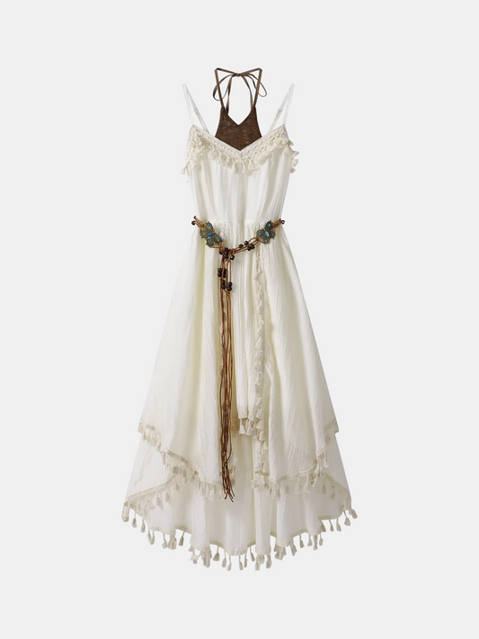 White dress with brown belt and decorative elements on a white background