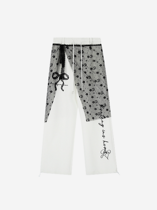 Trousers with floral pattern and text on a white background