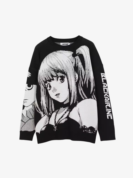 Black and white sweater with anime character design on a white background