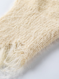 Close-up of a textured beige fabric on a white background