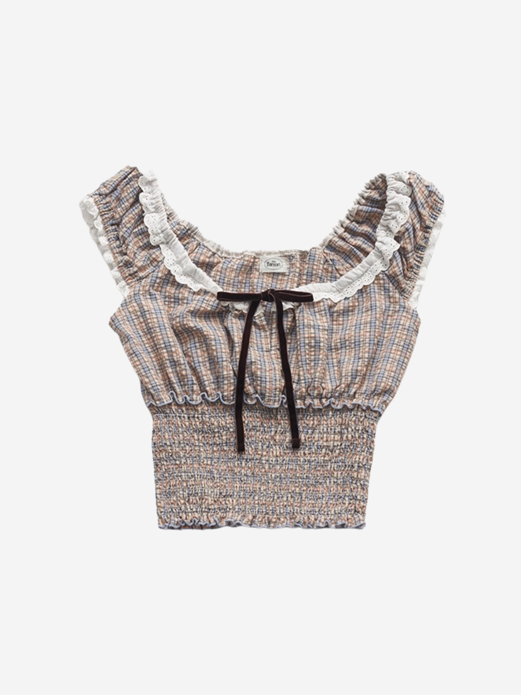 Plaid crop top with ruffled details on a white background