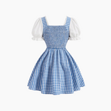 Blue checkered dress with white puffed sleeves on a white background