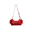 Red handbag with a gold buckle on a white background