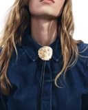 Asymmetrical round tie necklace