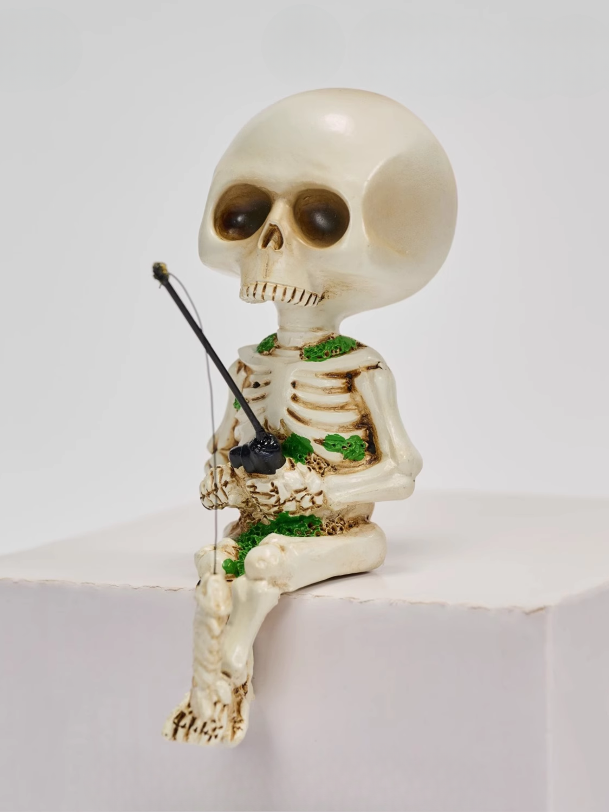 Skeleton Fisherman Figurine