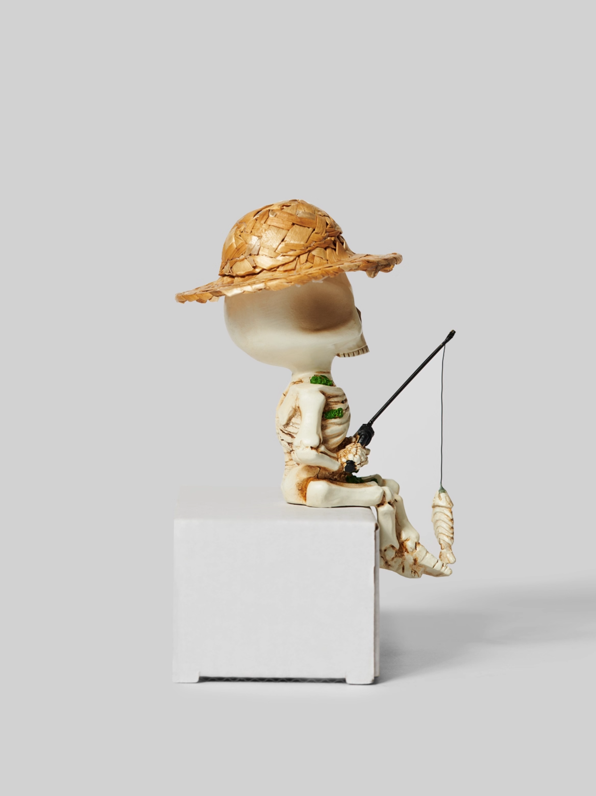 Skeleton Fisherman Figurine