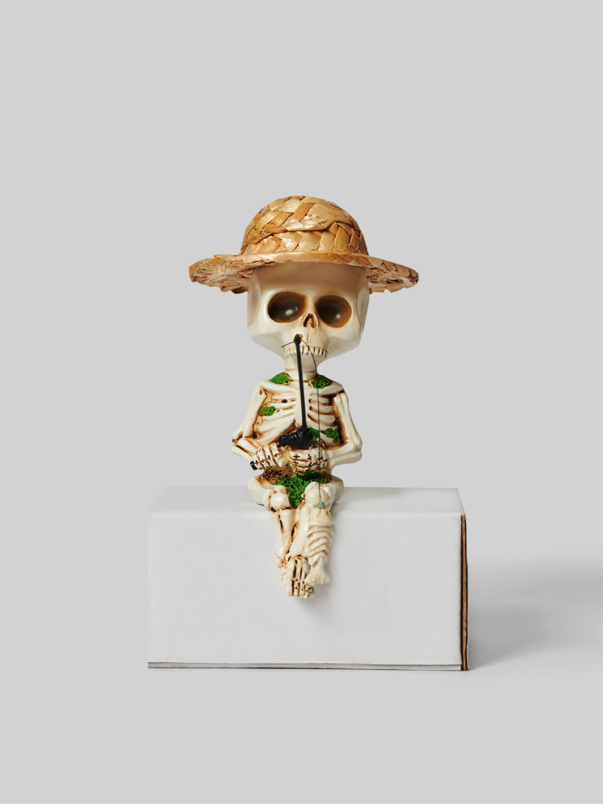 Skeleton Fisherman Figurine