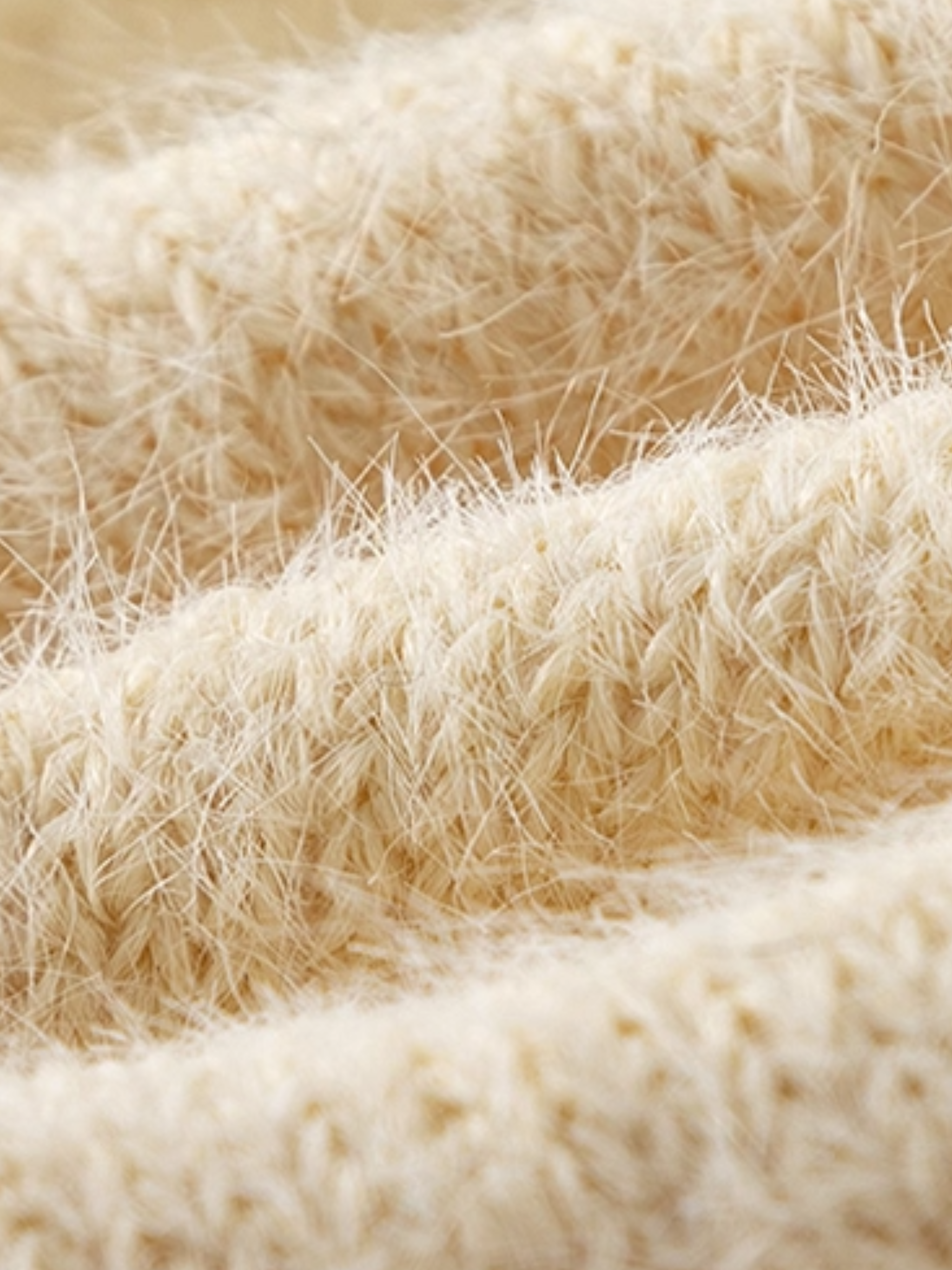 Close-up of beige carpet fibers